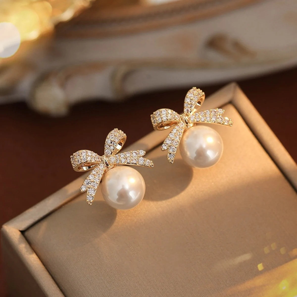 Elegant Bow Pearl Diamond Earrings
