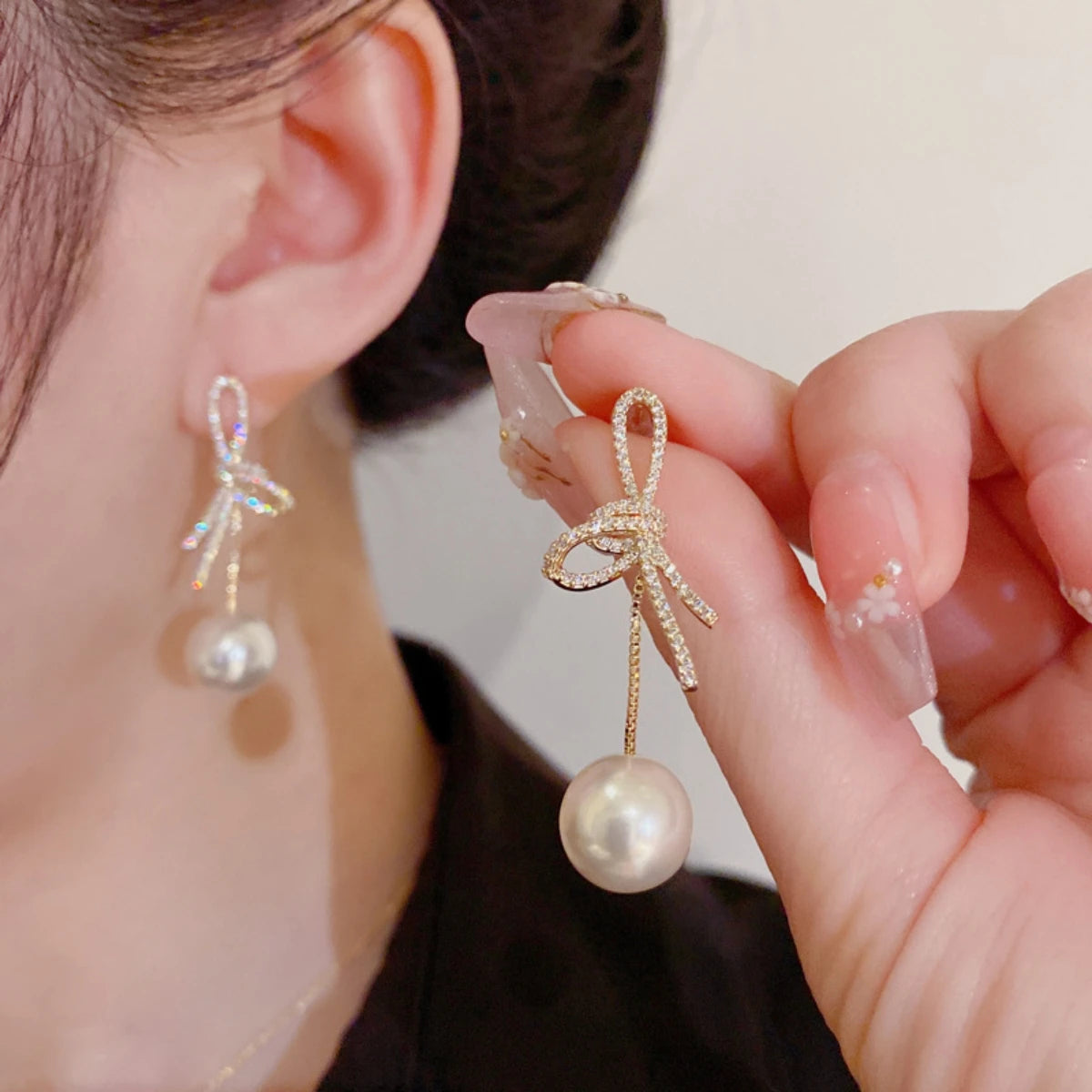 Elegant Bow Pearl Diamond Earrings