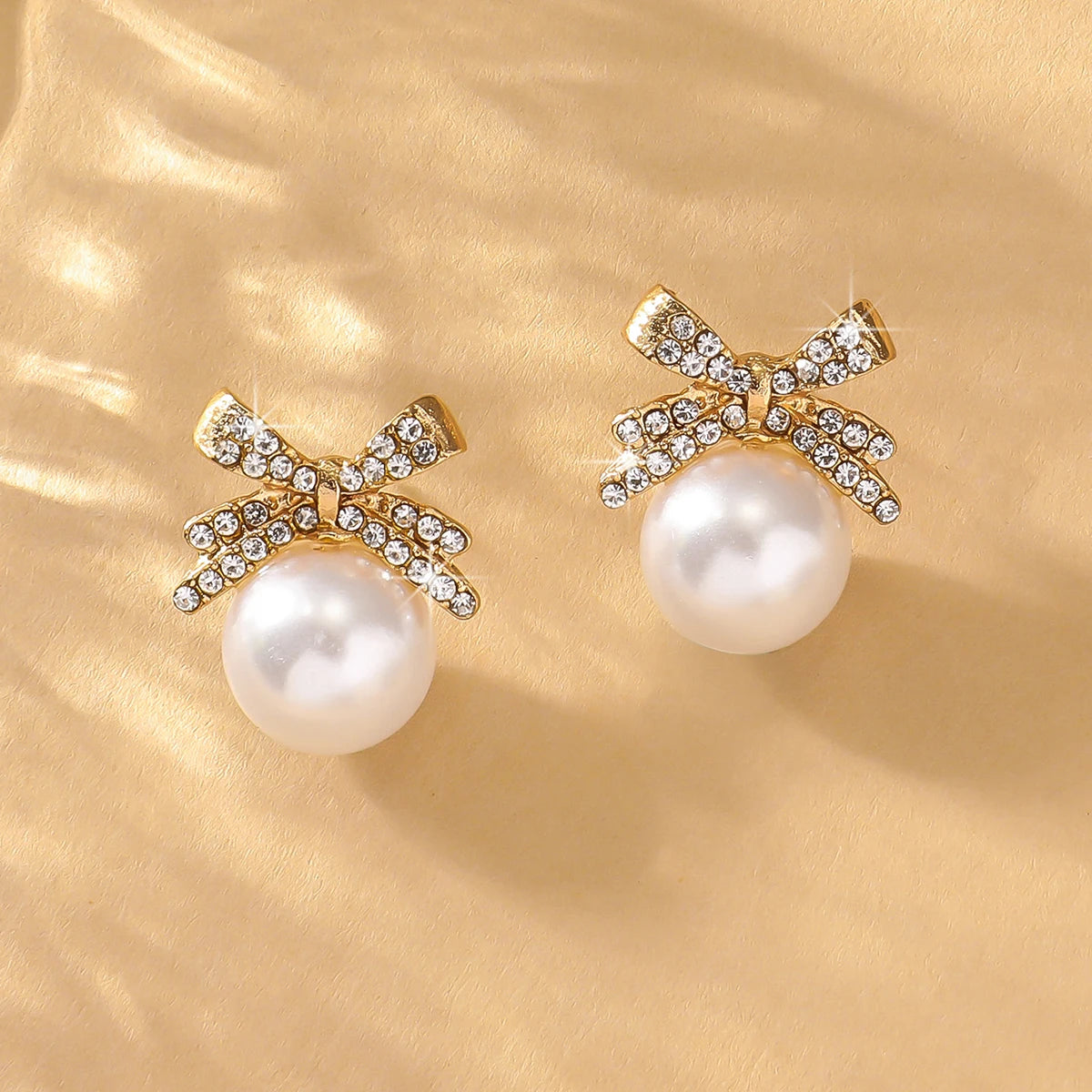 Elegant Bow Pearl Diamond Earrings