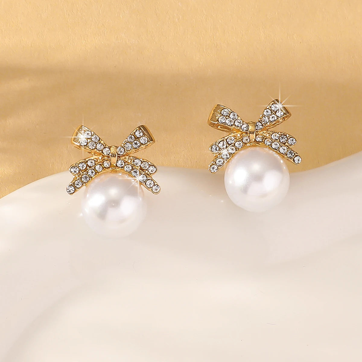 Elegant Bow Pearl Diamond Earrings