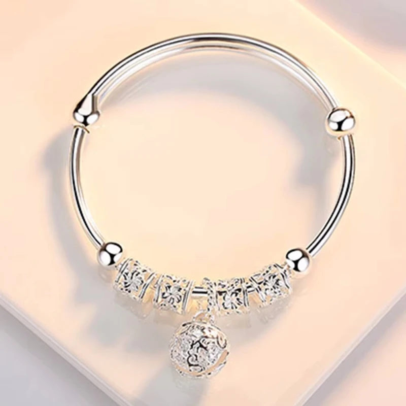 Sterling Silver Hollow Bell Bangle – Adjustable Women’s Bracelet