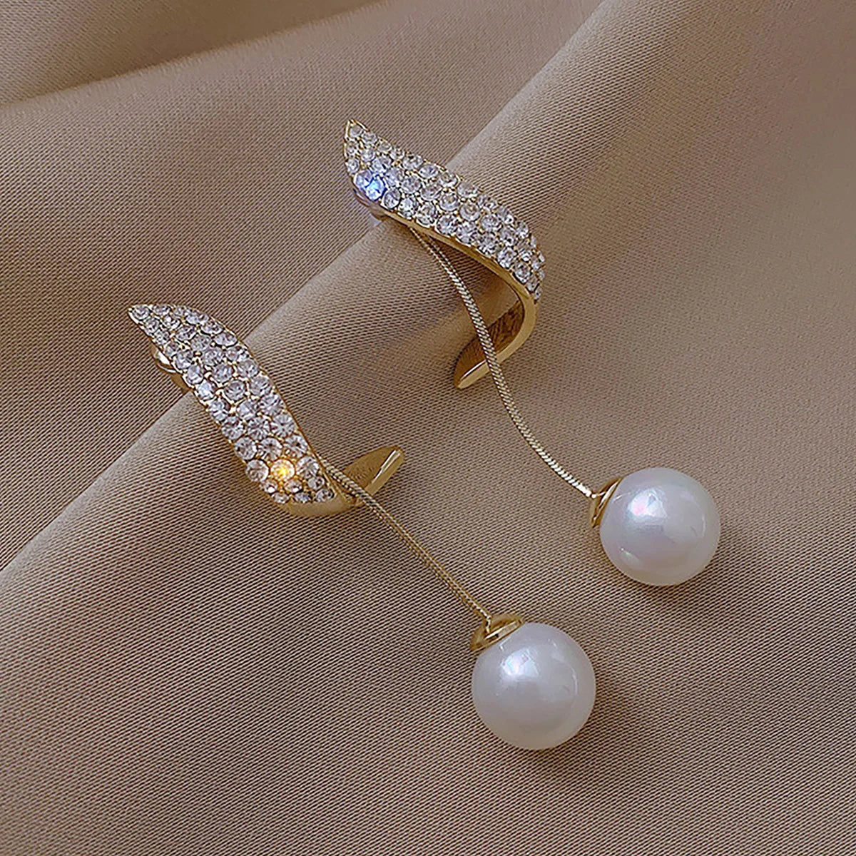 Elegant Bow Pearl Diamond Earrings