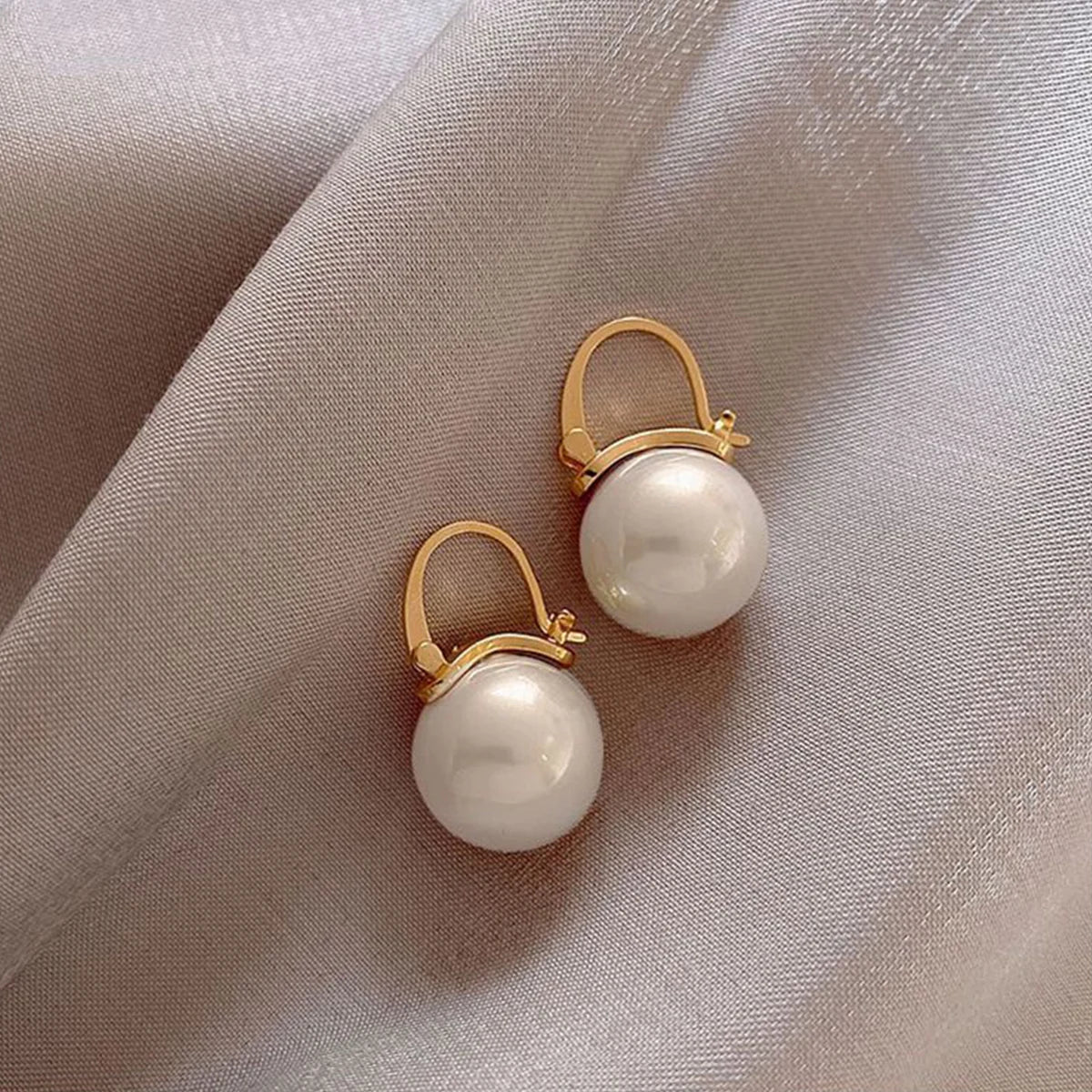 Elegant Bow Pearl Diamond Earrings
